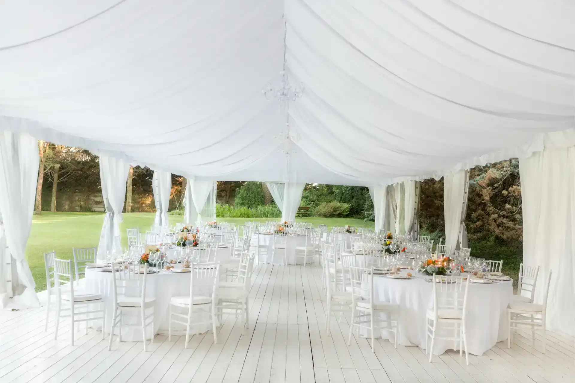 wedding marquee interior showing tables and chairs