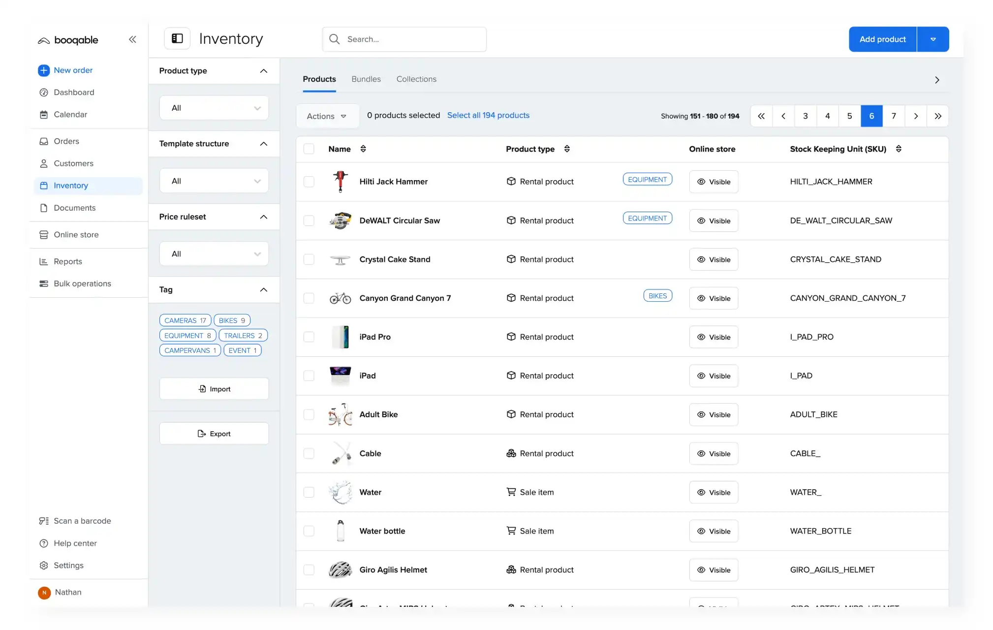 Person managing stock using rental inventory software